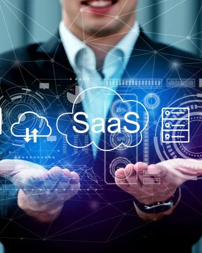 Cloud and SaaS service icons illustrated above a businessman's open hands