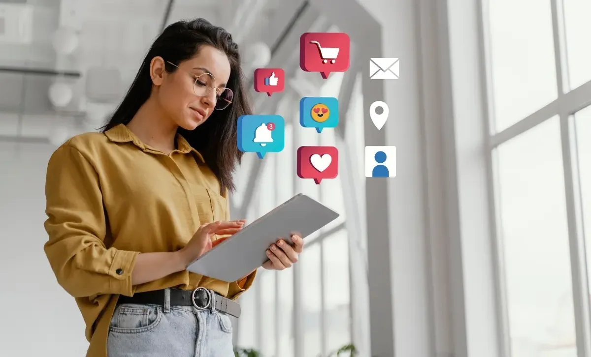 Marketing specialist reviewing campaign engagement on a tablet